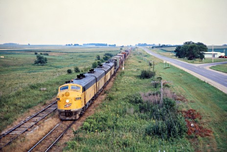 Northbound Chicago and North Western Railway freight train in Kenyon, Minnesota, on July 26, 1976. Photograph by John F. Bjorklund, © 2015, Center for Railroad Photography and Art. Bjorklund-24-27-02.
