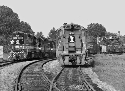 Northbound Southern Railway freight train departs yard in Meridian, Mississippi, passing Illinois Central Railroad Geep no. 8224 awaiting assignment in June 1970. Photograph by J. Parker Lamb, © 2016, Center for Railroad Photography and Art. Lamb-01-111-09
