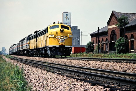 Eastbound Amtrak passenger train on the Chicago and North Western Railway in Clinton, Iowa, on July 5, 1981. Photograph by John F. Bjorklund, © 2015, Center for Railroad Photography and Art. Bjorklund-28-14-04