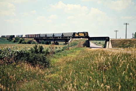 Eastbound Chicago and North Western Railway freight train in Cobden, Minnesota, on July 22, 1976. Photograph by John F. Bjorklund, © 2015, Center for Railroad Photography and Art. Bjorklund-25-04-02.