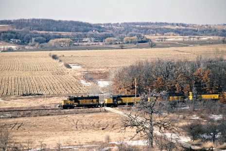 Westbound Chicago and North Western Railway freight train in Wales, Wisconsin, in March 1982. Photograph by John F. Bjorklund, © 2015, Center for Railroad Photography and Art. Bjorklund-27-20-18