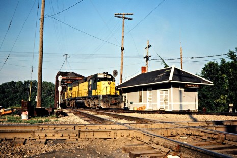 Westbound Chicago and North Western Railway freight train in Leavenworth, Kansas, on July 12, 1981. Photograph by John F. Bjorklund, © 2015, Center for Railroad Photography and Art. Bjorklund-28-13-16
