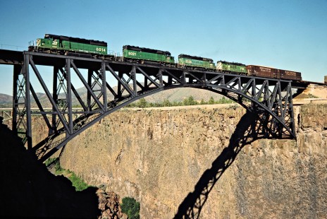 Northbound Burlington Northern Railroad freight train crossing the Crooked River in Terrebonne, Oregon, on June 30, 1984. Photograph by John F. Bjorklund, © 2015, Center for Railroad Photography and Art. Bjorklund-12-26-14