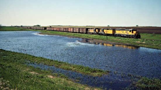Eastbound Chicago and North Western Railway freight train in Volga, South Dakota, on May 20, 1978. Photograph by John F. Bjorklund, © 2015, Center for Railroad Photography and Art. Bjorklund-26-06-03