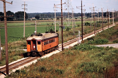 Westbound South Shore Line passenger train at New Carlisle, Indiana, on September 6, 1980. Photograph by John F. Bjorklund, © 2015, Center for Railroad Photography and Art. Bjorklund-42-10-01