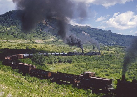 Three narrow-gauge steam locomotives power a chartered freight train on the Cumbres & Toltec Scenic Railroad in July 1996. Photograph by Fred M. Springer, © 2016, Center for Railroad Photography and Art. Springer-CO6-18-19