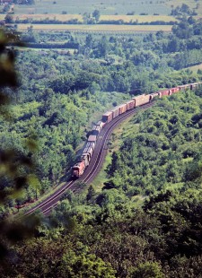 Westbound Canadian Pacific Railway freight train at Niagara Escarpment in Milton, Ontario, on July 4, 1985. Photograph by John F. Bjorklund, © 2015, Center for Railroad Photography and Art. Bjorklund-38-19-19