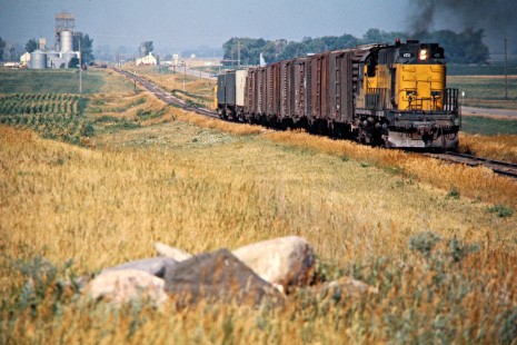 Eastbound Chicago and North Western Railway freight train in Revere, Minnesota, on July 22, 1976. Photograph by John F. Bjorklund, © 2015, Center for Railroad Photography and Art. Bjorklund-25-03-05.