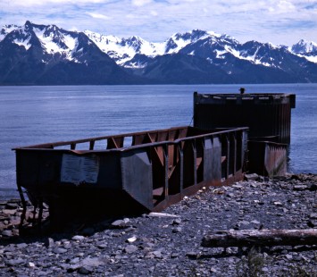 Abandoned railroad freight car near the water of Resurrection Bay in Seward, Alaska, in c. 1968. Photograph by Leo King, © 2015, Center for Railroad Photography and Art. King-02-004-005
