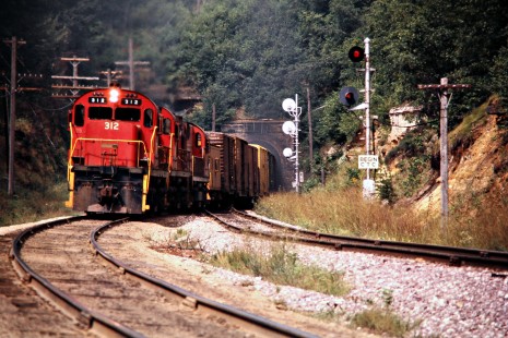 Eastbound Green Bay and Western Railroad freight train in Tunnel City, Wisconsin, on August 26, 1975. Photograph by John F. Bjorklund, © 2015, Center for Railroad Photography and Art. Bjorklund-43-17-03