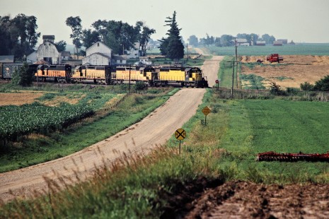Westbound Chicago and North Western Railway freight train in Ankeny, Iowa, on July 6, 1981. Photograph by John F. Bjorklund, © 2015, Center for Railroad Photography and Art. Bjorklund-28-12-02