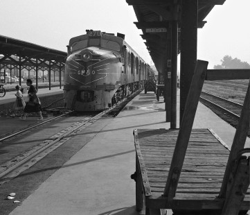 Southbound Gulf, Mobile and Ohio Railroad <i>Gulf Coast Rebel</i>, led by Alco DL-109 units, has arrived at station in Meridian, Mississippi, in early morning after overnight run from St. Louis, Missouri, in July 1954. Photograph by J. Parker Lamb, © 2016, Center for Railroad Photography and Art. Lamb-01-132-10