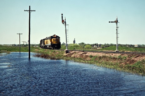Eastbound Chicago and North Western Railway freight train about to cross the Burlington Northern in Arlington, South Dakota, on May 20, 1978. Photograph by John F. Bjorklund, © 2015, Center for Railroad Photography and Art. Bjorklund-26-06-07
