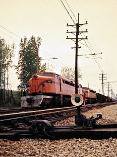 Eastbound South Shore Line freight train at Dune Acres, Indiana, on April 23, 1977. Photograph by John F. Bjorklund, © 2015, Center for Railroad Photography and Art. Bjorklund-42-07-09
