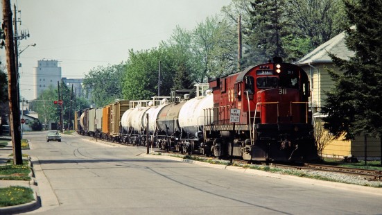 Eastbound Green Bay and Western Railroad freight train in Green Bay, Wisconsin, on May 15, 1982. Photograph by John F. Bjorklund, © 2015, Center for Railroad Photography and Art. Bjorklund-43-11-03