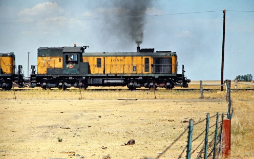 Eastbound Chicago and North Western Railway Alco RSD5 locomotive no. 1688 in Harrold, South Dakota, on July 24, 1976. Photograph by John F. Bjorklund, © 2015, Center for Railroad Photography and Art. Bjorklund-25-11-13.