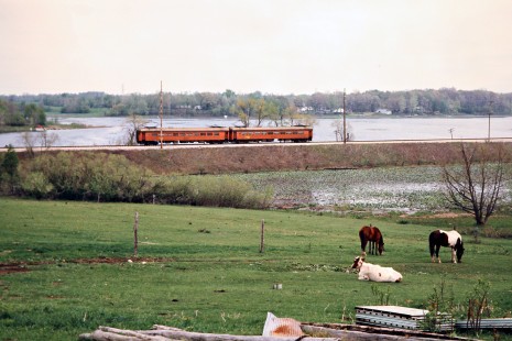 Eastbound South Shore Line passenger train at Hudson Lake, Indiana, on April 23, 1977. Photograph by John F. Bjorklund, © 2015, Center for Railroad Photography and Art. Bjorklund-42-06-03