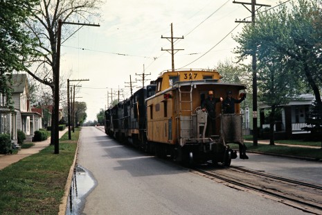 Eastbound South Shore Line freight train at Michigan City, Indiana, on April 23, 1977. Photograph by John F. Bjorklund, © 2015, Center for Railroad Photography and Art. Bjorklund-42-07-20