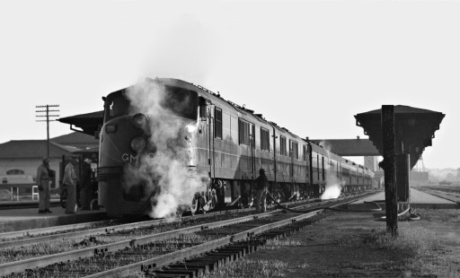 Mobile-bound Gulf, Mobile and Ohio Railroad <i>Gulf Coast Rebel</i> passenger train, led by two Baldwin DR-6-4-20 locomotives, at the station in Meridian, Mississippi, in early morning, May 1951. Photograph by J. Parker Lamb, © 2016, Center for Railroad Photography and Art. Lamb-01-132-02