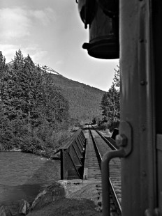 View out of the back of an Alaska Railroad passenger train, c. 1973. Photograph by Leo King, © 2015, Center for Railroad Photography and Art. King-03-020-003