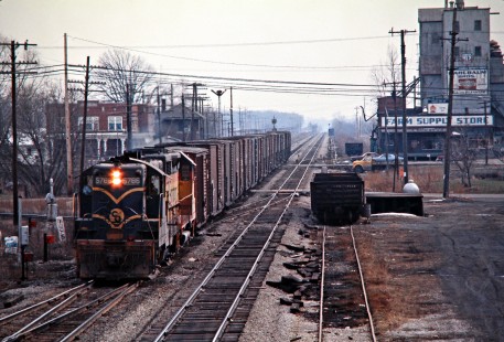Northbound Chesapeake and Ohio Railway freight train passing through Carleton, Michigan, on March 27, 1977. Photograph by John F. Bjorklund, © 2015, Center for Railroad Photography and Art. Bjorklund-33-27-05