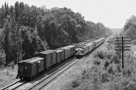 Southbound Southern Railway <i>Southerner</i> passenger train slips past freight at Smith siding (east of Meridian, Mississippi) in July 1953. Photograph by J. Parker Lamb, © 2016, Center for Railroad Photography and Art. Lamb-01-105-04