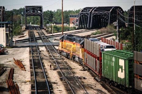 Westbound CSX Transportation freight train at busy track crossing in Blue Island, Illinois, on September 24, 1988. Photograph by John F. Bjorklund, © 2015, Center for Railroad Photography and Art. Bjorklund-44-06-08