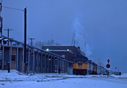 Alaska Railroad passenger train led by EMD FP7A locomotive no. 1512 at night in Anchorage, Alaska, c. 1968. Photograph by Leo King, © 2015, Center for Railroad Photography and Art. King-02-031-003