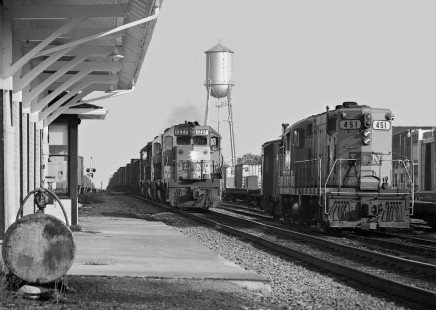 Nashville-bound Louisville and Nashville Railroad empty coal train passes station at Tullahoma, Tennessee, in late afternoon during August 1965. Photograph by J. Parker Lamb, © 2016, Center for Railroad Photography and Art. Lamb-01-144-07