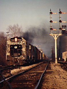 Westbound Conrail freight train passing Morgan Tower in Quincy, Ohio, on March 22, 1980. Photograph by John F. Bjorklund, © 2016, Center for Railroad Photography and Art. Bjorklund-81-24-17