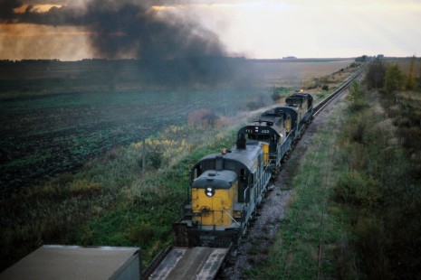 Westbound Chicago and North Western Railway near Kasson, Minnesota, on October 10, 1977. Photograph by John F. Bjorklund © 2015, Center for Railroad Photography and Art. Bjorklund-25-26-06