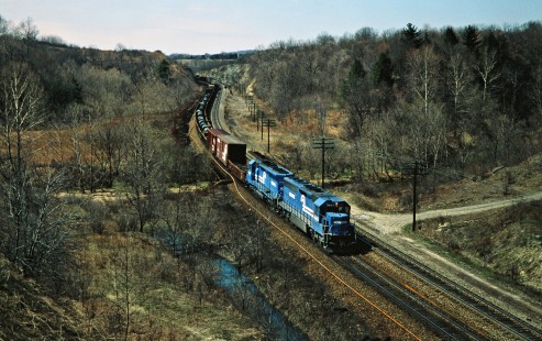 Eastbound Conrail freight train near Broadacre, Ohio, on April 7, 1979. Photograph by John F. Bjorklund, © 2016, Center for Railroad Photography and Art. Bjorklund-81-12-24