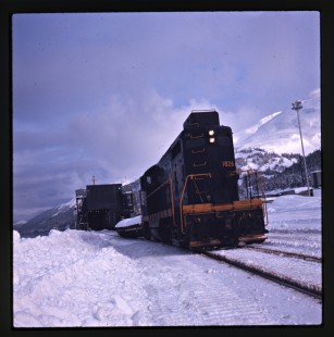 Alaska Railroad EMD GP7L locomotive no. 1826 switching the car ferry at Whittier, c. 1973. Photograph by Leo King, © 2015, Center for Railroad Photography and Art. King-02-028-010