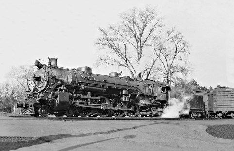 Lanky ex-FEC 4-8-2 awaits highball for West Point Route westbound local no. 31 at station in Auburn, Alabama, in October 1952. Photograph by J. Parker Lamb, © 2016, Center for Railroad Photography and Art. Lamb-02-018-02