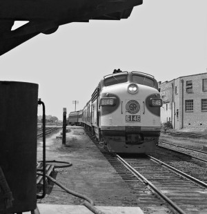 Northbound Southern Railway no. 44, the <i>Queen & Crescent Limited</i> passenger train, slides into Mississippi's Meridian Union Station before noon in July 1950. Photograph by J. Parker Lamb, © 2016, Center for Railroad Photography and Art. Lamb-01-099-01