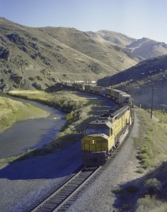 First section of westbound Union Pacific Railroad freight train OMN near Huntington, Oregon on September 9, 1979. Photograph by Victor Hand. Hand-UP-C64-52.JPG
