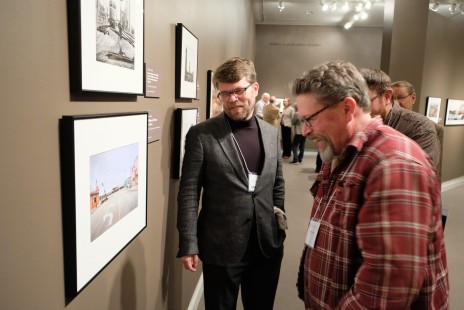 Alexander Craghead and Joel Jensen admire Jensen's print featured in the "After Promontory" exhibition. Photograph by Scott Lothes.