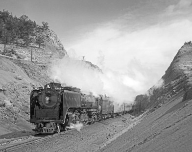 Union Pacific Railroad steam locomotive no. 8444 hauls westbound passenger train near Dale, Wyoming, on March 28, 1971. Photograph by Victor Hand. Hand-UP-64-242.JPG