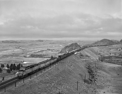 Union Pacific Railroad diesel locomotive no. 74 with a westbound freight train in Dale, Wyoming, on May 10, 1968. Photograph by Victor Hand. Hand-UP-64-055.JPG