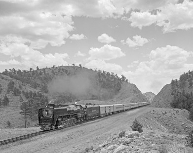 Union Pacific Railroad steam locomotive no. 8444 leads westbound excursion train in Perkins, Wyoming, on May 30, 1969. Train is en route from  from Denver, Colorado to Laramie, Wyoming. Photograph by Victor Hand. Hand-UP-64-177.JPG