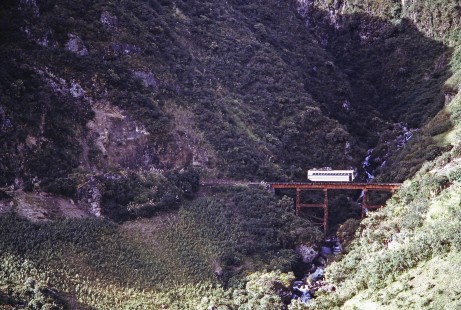 Empresa de Ferrocarriles Ecuatorianos rail-bus no. 97 crosses a bridge near Cuenca, Azuay, Ecuador, on July 24, 1988. Photograph by Fred M. Springer,  © 2014, Center for Railroad Photography and Art, Springer-ECU1-08-15
