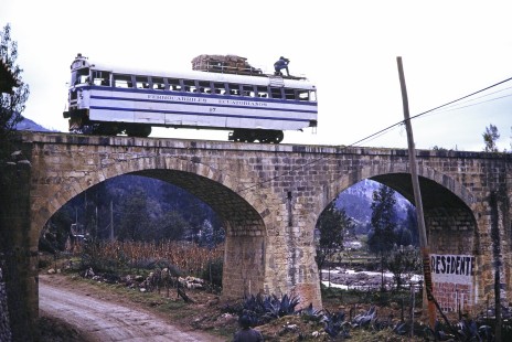 Empresa de Ferrocarriles Ecuatorianos rail-bus no. 97 crosses a bridge at Azogues, Cañar, Ecuador, on July 26 1988. Photograph by Fred M. Springer, © 2014, Center for Railroad Photography and Art, Springer-ECU1-09-25