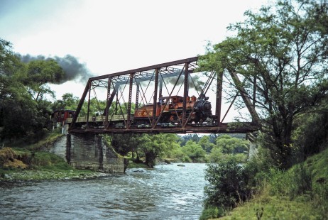 Guayaquil-Quito Railway Railway steam locomotive no. 14 leads train over the bridge near Azogues, Canar, Ecuador, on July 12, 1990. Photograph by Fred M. Springer, © 2014, Center for Railroad Photography and Art, Springer-SOAM1-04-30