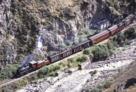 En route to Huigra, Guayaquil-Quito Railway locomotive no. 45 leads passenger train near Alausi, Chimborazo, Ecuador, on July 31, 1988. Photograph by Fred M. Springer, © 2014, Center for Railroad Photography and Art, Springer-ECU1-16-13