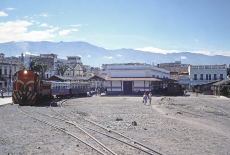 Empresa de Ferrocarriles Ecuatorianos diesel locomotive no. 164 leads a passenger train at Riobamba, Chimborazo, Ecuador, on July 27, 1988. Photograph by Fred M. Springer, © 2014, Center for Railroad Photography and Art, Springer-ECU1-11-10
