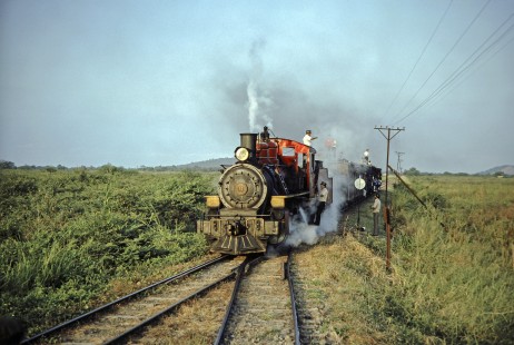 Guayaquil-Quito Railway steam locomotive no. 7 with a train in Casiguana, Guayas, Ecuador, on July 8, 1990. Photograph by Fred M. Springer, © 2014, Center for Railroad Photography and Art, Springer-ECU1-21-32