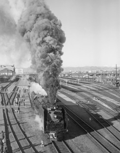 Union Pacific Railroad steam locomotive no. 8444 leads westbound excursion from Denver, Colorado to Laramie, Wyoming. This image was shot in Denver, Colorado, on March 28, 1971. Photograph by Victor Hand. Hand-UP-64-234.JPG