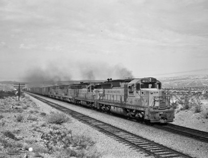 Union Pacific Railroad locomotive no. 421 with a westbound freight train in Farrier, Nevada, on November 15, 1967. Photograph by Victor Hand. Hand-UP-64-007.JPG