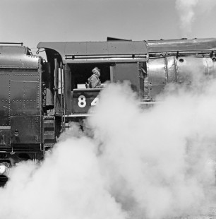 An engineer in Union Pacific Railroad steam locomotive no. 8444 at Green River, Wyoming, on August 31, 1968. Photograph by Victor Hand. Hand-UP-64-125.JPG