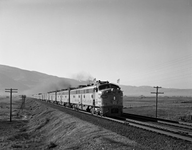 Union Pacific Railroad locomotive no. 907 leads eastbound train, no. 104, the <i> City of Los Angeles </i>, en route from Los Angeles, California to Chicago, Illinois. This image was shot in Farmington, Utah, on May 10, 1969, the centennial of the completion of the first transcontinental railroad. Photograph by Victor Hand. Hand-UP-64-143.JPG